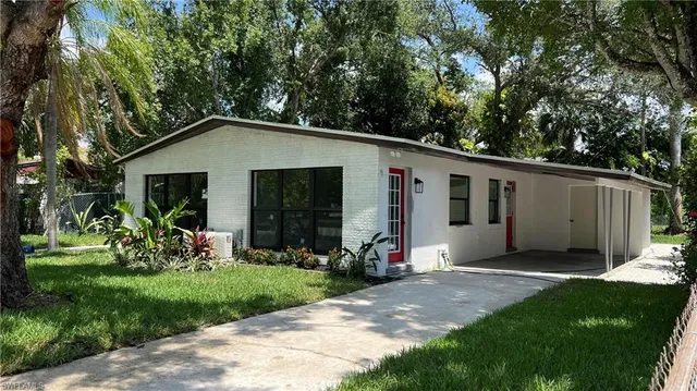 a front view of a yard with fountain