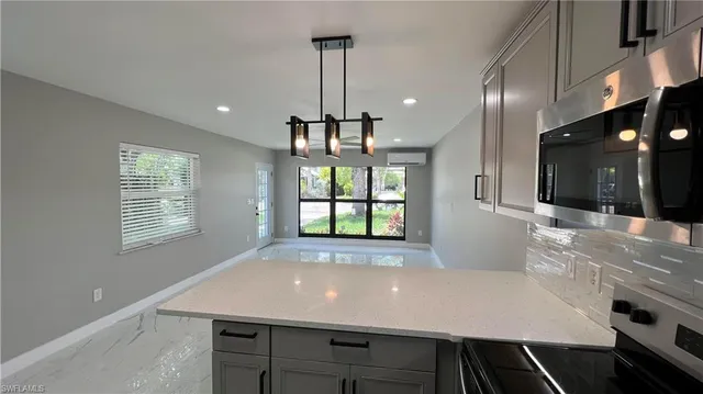 a view of kitchen and window