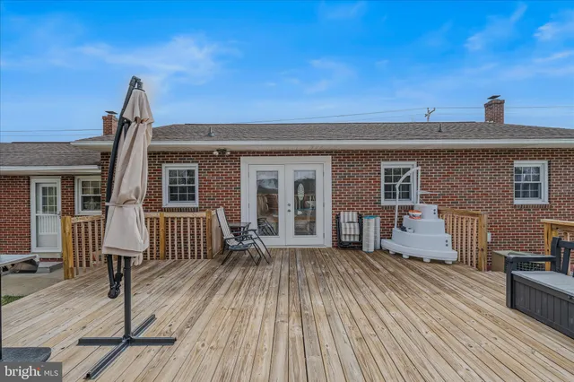 a front view of a house with a patio