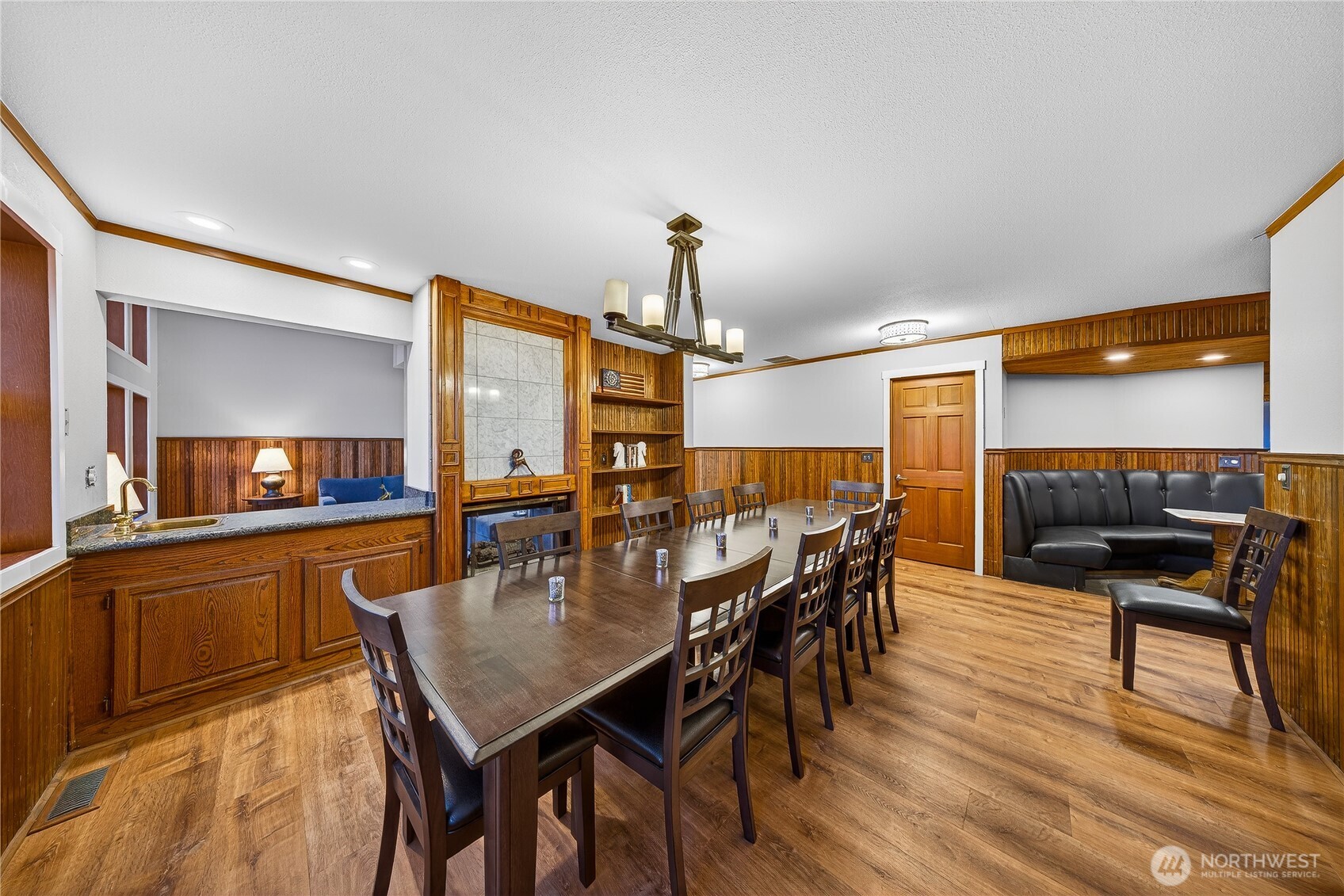 5972 Hastings Road Clinton, WA 98236 - Photo 27 of 40 a view of a dining room with furniture and wooden floor