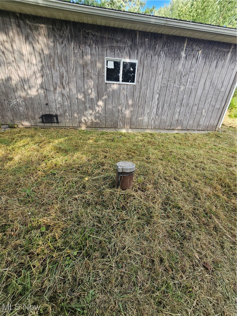 2708 Highway 6 Rome, OH 44085 - Photo 22 of 27 View of home's exterior with a yard