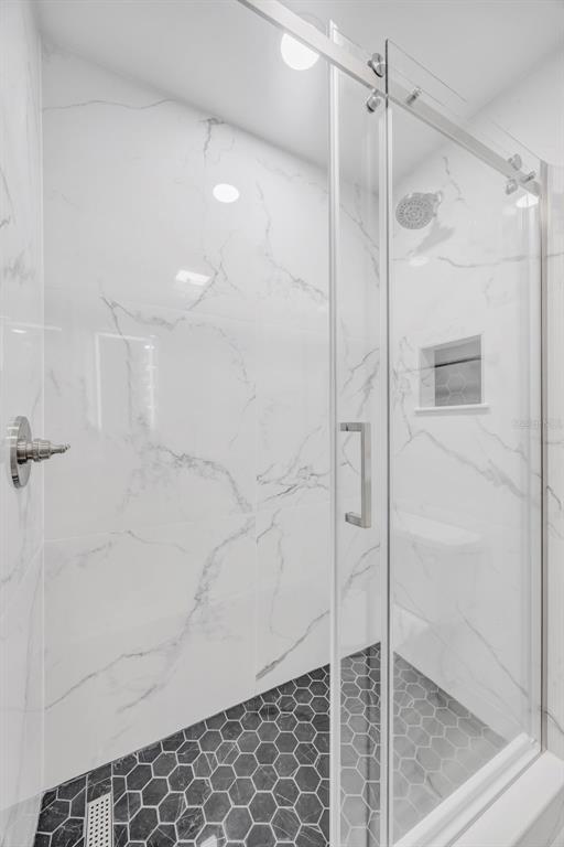 11728 Raintree Drive Temple Terrace, FL 33617 - Photo 20 of 41 a bathroom with a shower