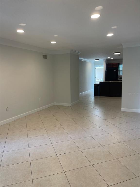 2500 Lee Road, Unit 202 Winter Park, FL 32789 - Photo 13 of 39 a view of an empty room with a window