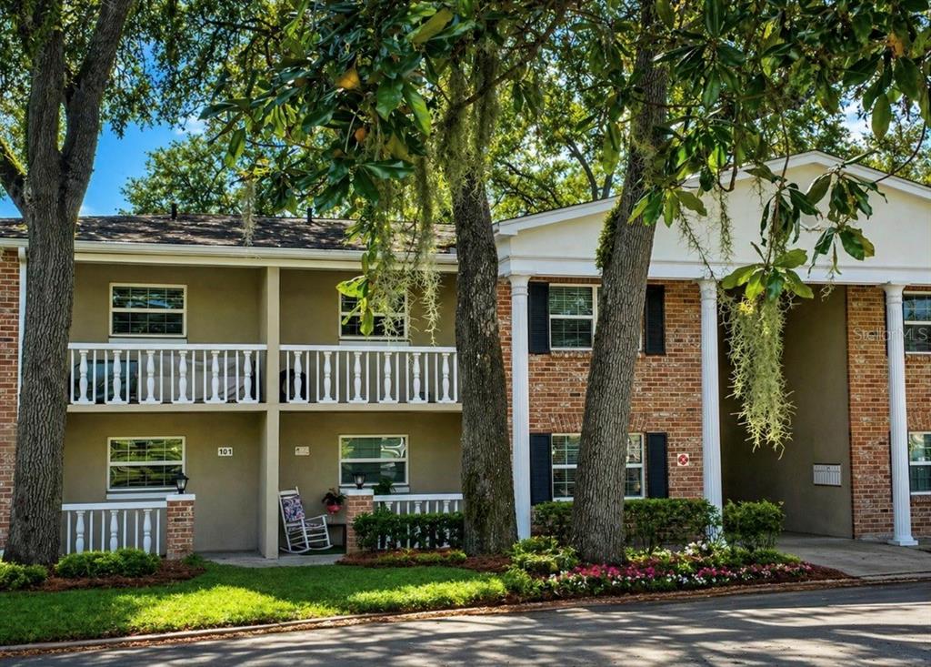 2500 Lee Road, Unit 202 Winter Park, FL 32789 - Photo 2 of 52 front view of a house with a yard