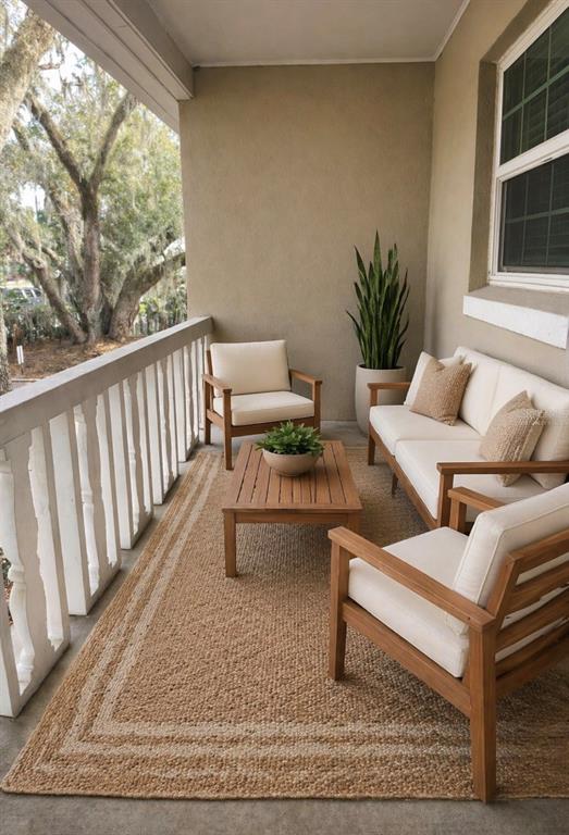 2500 Lee Road, Unit 202 Winter Park, FL 32789 - Photo 23 of 52 a living room with furniture and a potted plant