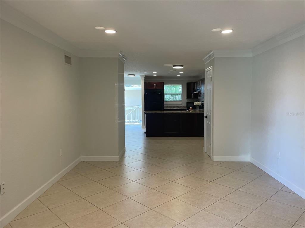2500 Lee Road, Unit 202 Winter Park, FL 32789 - Photo 27 of 52 a view of kitchen and refrigerator