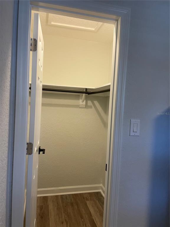 2500 Lee Road, Unit 202 Winter Park, FL 32789 - Photo 46 of 52 a bathroom with a glass shower door