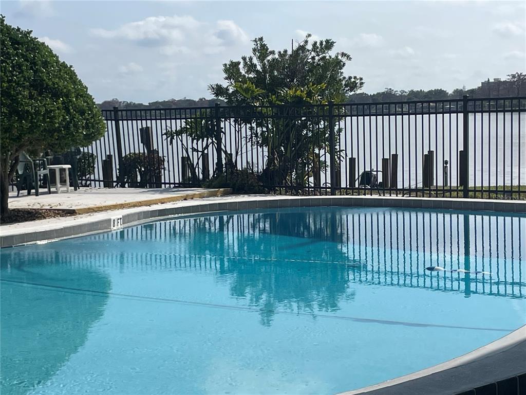 2500 Lee Road, Unit 202 Winter Park, FL 32789 - Photo 8 of 52 a view of swimming pool from a balcony