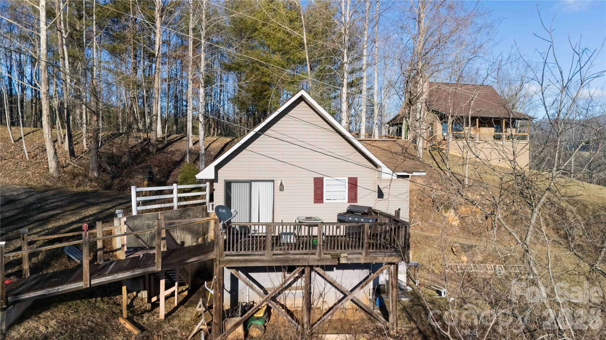 722 Union Hill Ridge Road Green Mountain, NC 28740 - Photo 12 of 21 a view of a house with backyard and sitting area