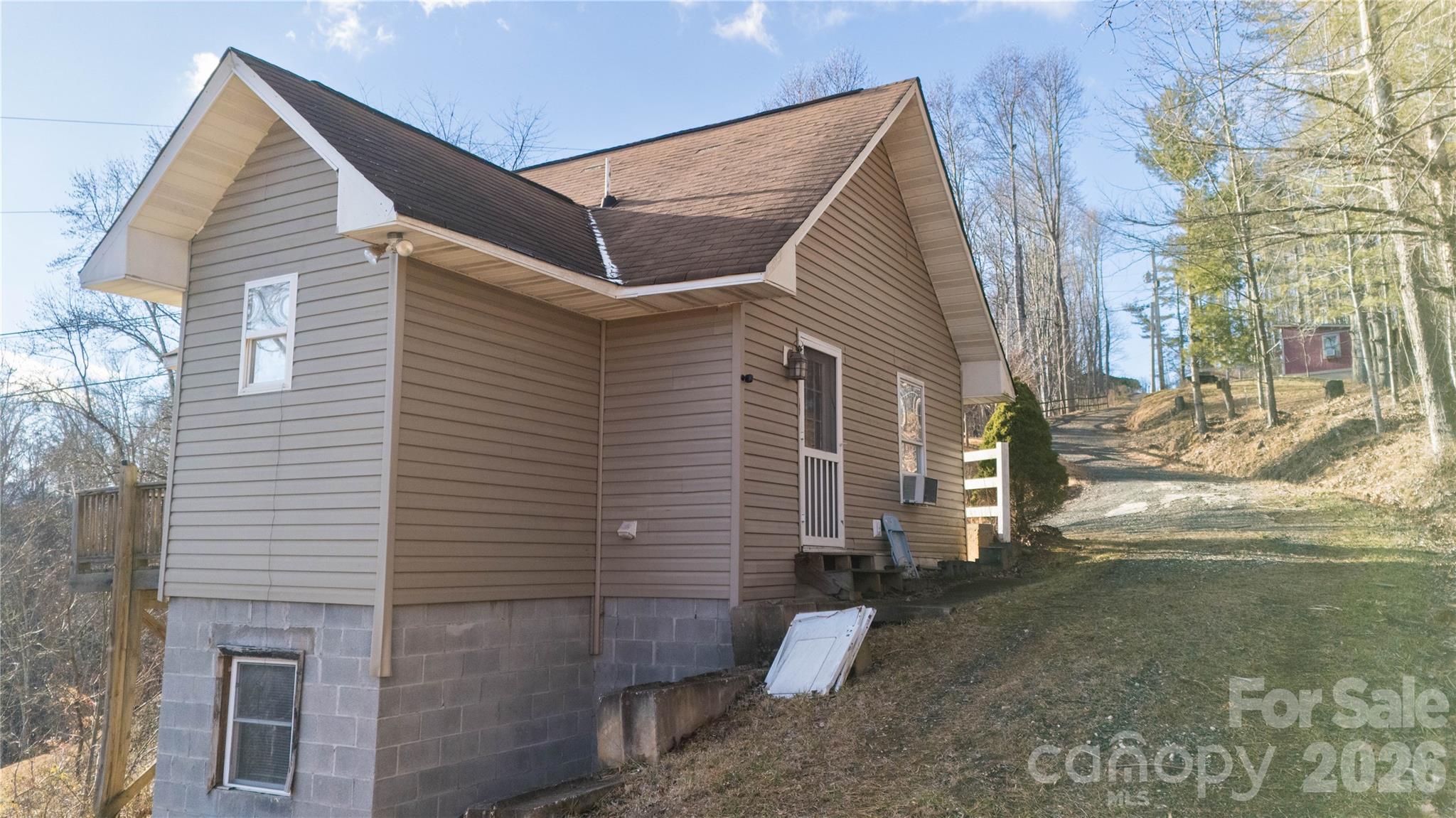722 Union Hill Ridge Road Green Mountain, NC 28740 - Photo 2 of 21 a view of a house with a yard