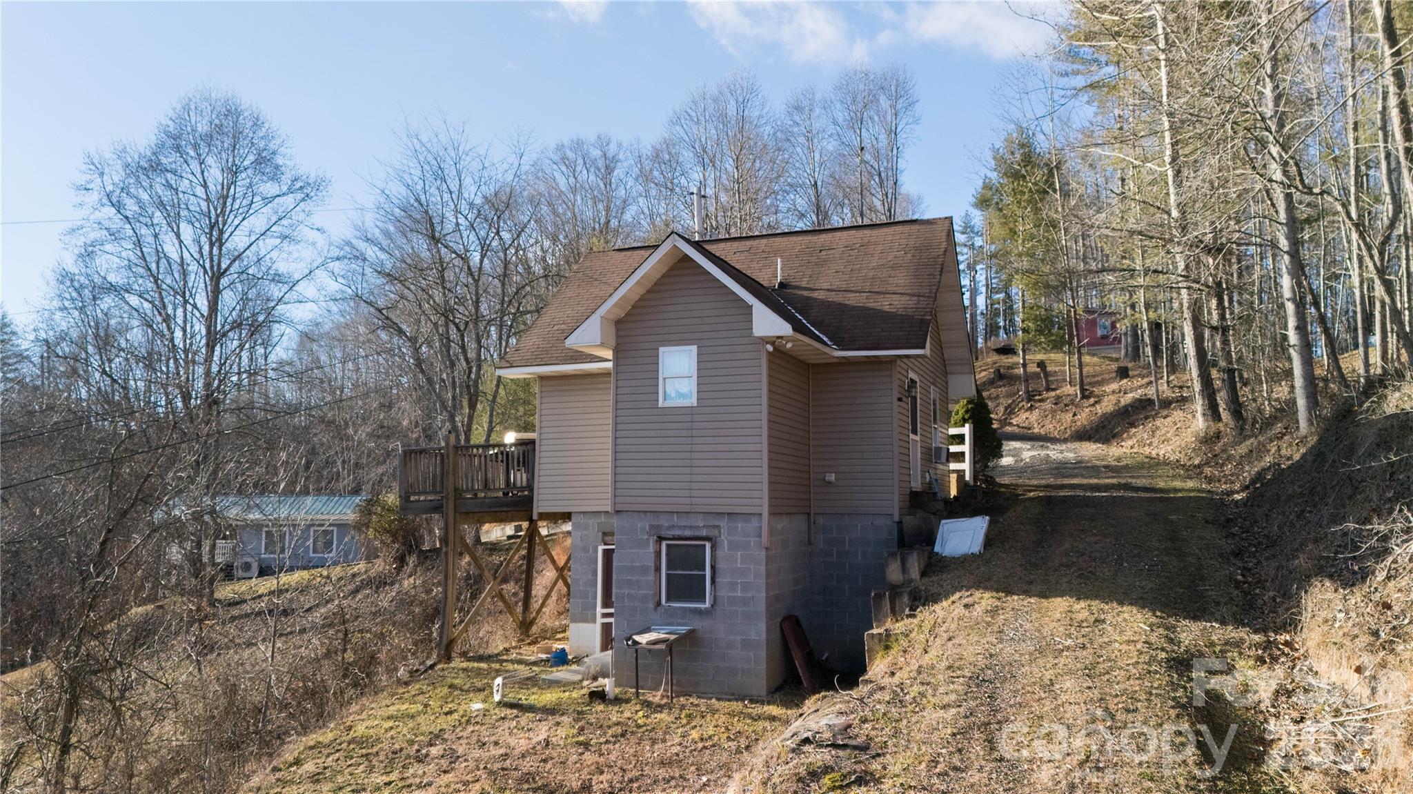 722 Union Hill Ridge Road Green Mountain, NC 28740 - Photo 3 of 21 a view of a house with a yard