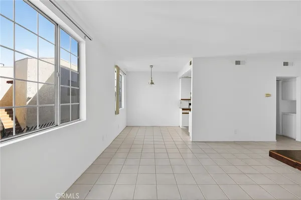 a kitchen with stainless steel appliances granite countertop a sink and a stove