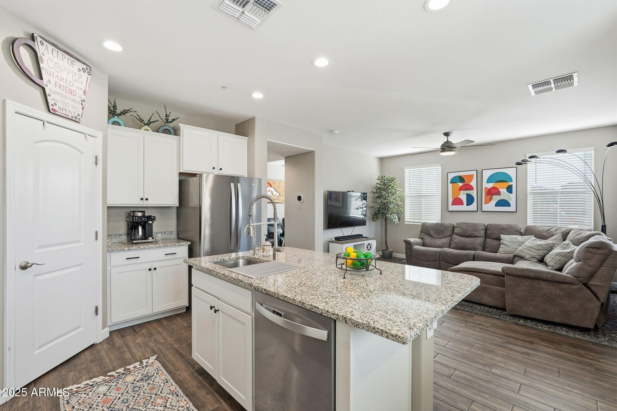 1255 North Arizona Avenue, Unit 1323 Chandler, AZ 85225 - Photo 12 of 30 a kitchen with stainless steel appliances granite countertop a refrigerator and a sink