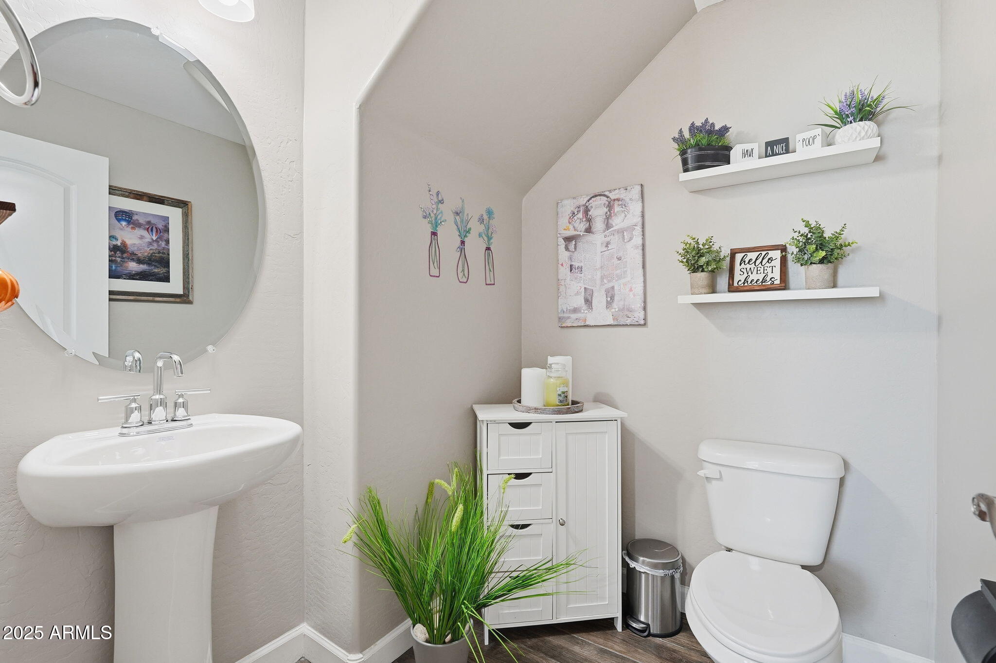 1255 North Arizona Avenue, Unit 1323 Chandler, AZ 85225 - Photo 17 of 30 a bathroom with a toilet a sink and mirror