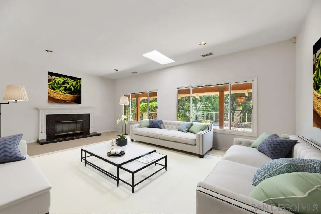 13260 Glen Circle Road Poway, CA 92064 - Photo 11 of 53 a living room with furniture and a fireplace