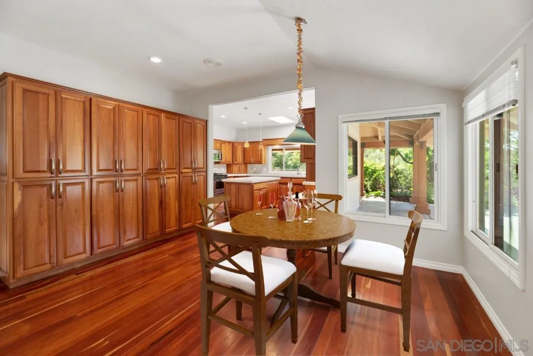 13260 Glen Circle Road Poway, CA 92064 - Photo 14 of 53 a view of a dining room with furniture window and wooden floor