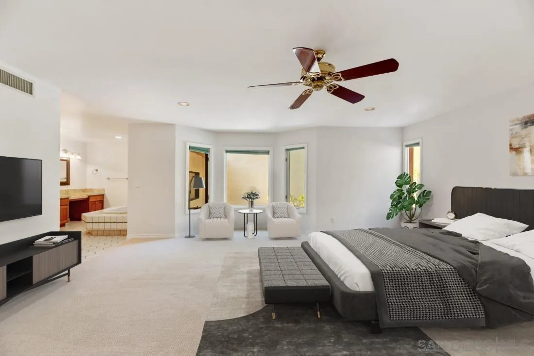 13260 Glen Circle Road Poway, CA 92064 - Photo 22 of 53 a bedroom with a bed and flat screen tv