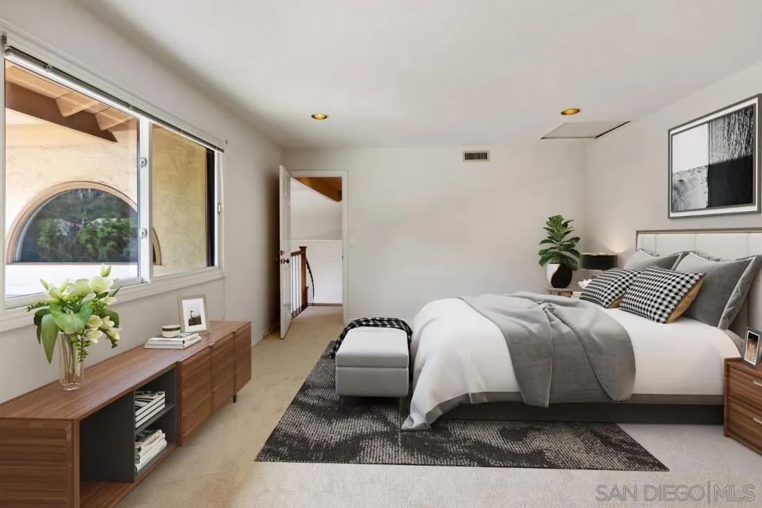 13260 Glen Circle Road Poway, CA 92064 - Photo 32 of 53 a bedroom with a bed lamp and a potted plant