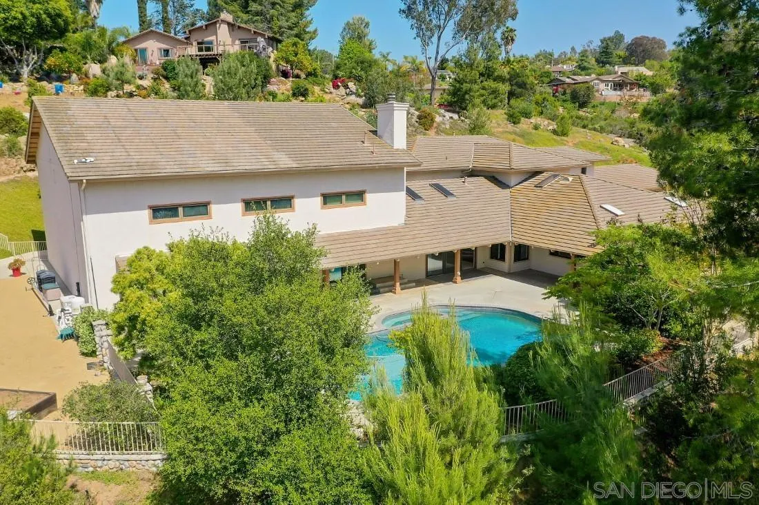 13260 Glen Circle Road Poway, CA 92064 - Photo 34 of 53 an aerial view of a house with yard and trees in the background