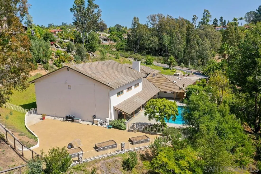 13260 Glen Circle Road Poway, CA 92064 - Photo 35 of 53 aerial view of a house with yard and trees in the background