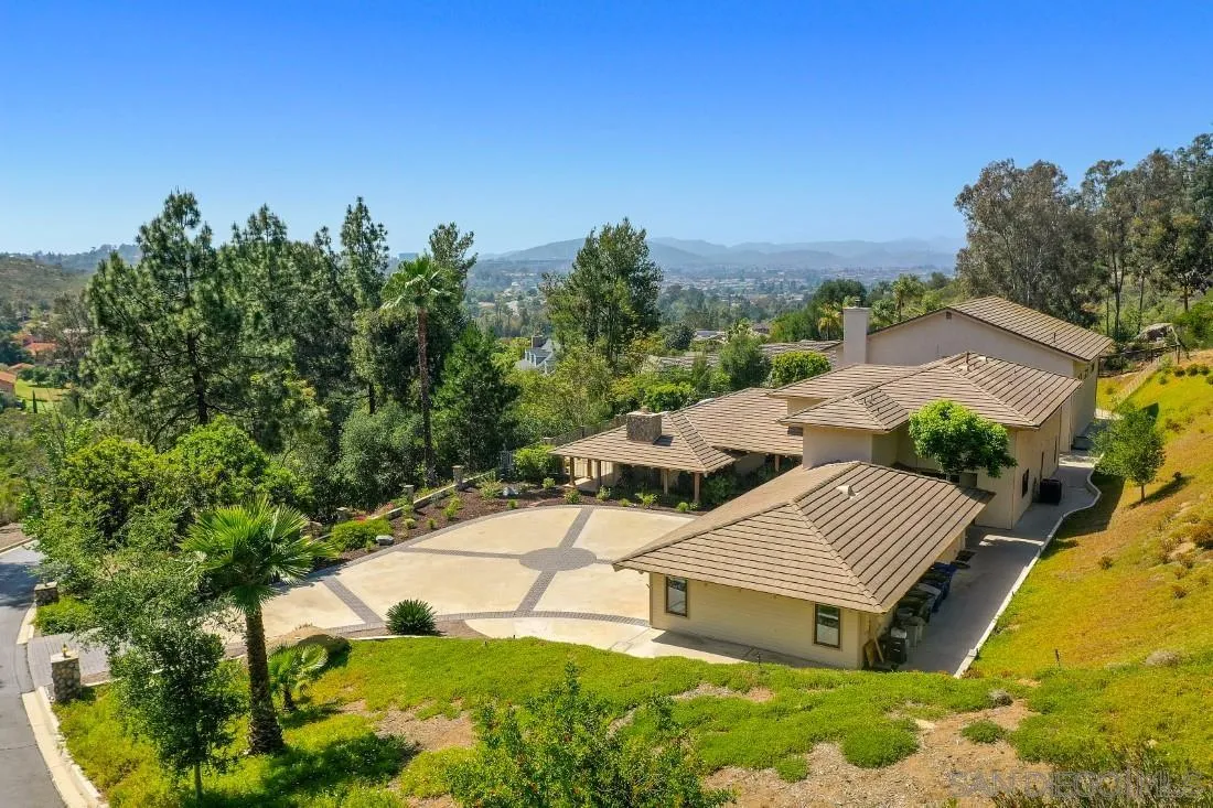 13260 Glen Circle Road Poway, CA 92064 - Photo 37 of 53 an aerial view of a house with yard and trees in the background