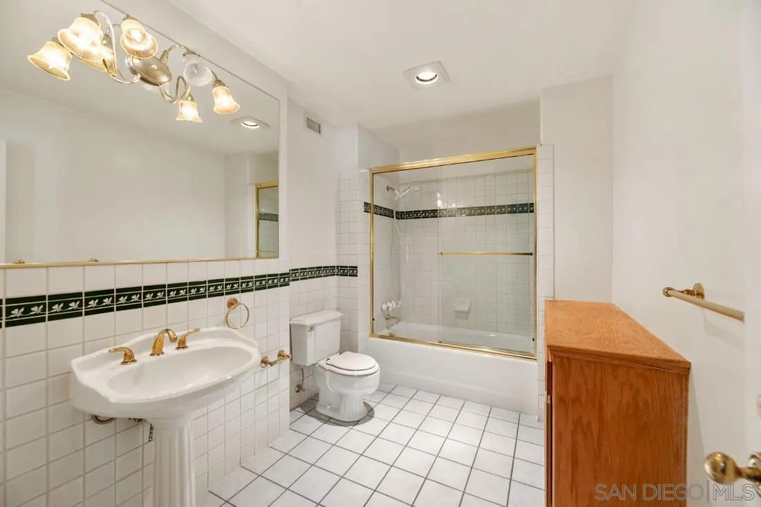 13260 Glen Circle Road Poway, CA 92064 - Photo 40 of 53 a bathroom with a sink a toilet and shower