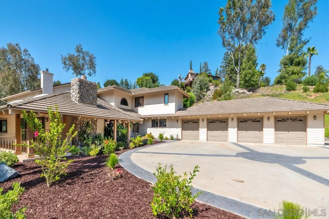 13260 Glen Circle Road Poway, CA 92064 - Photo 48 of 53 a front view of a house with a yard
