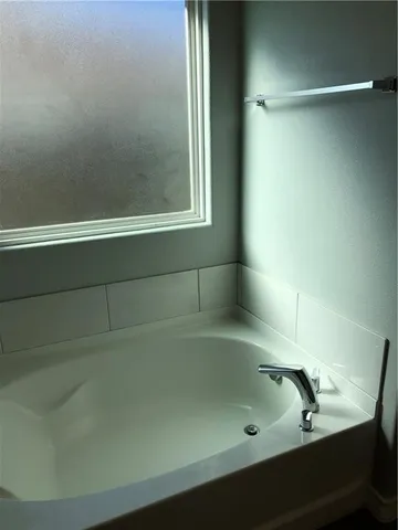 a bathroom with a bathtub