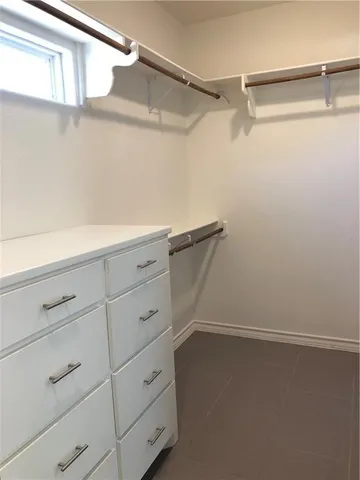 a view of a room with racks on the wall