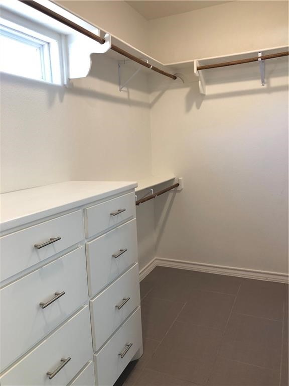 14834 Aquarius Street Corpus Christi, TX 78418 - Photo 24 of 34 a view of a room with racks on the wall
