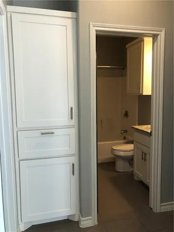 a bathroom with a toilet