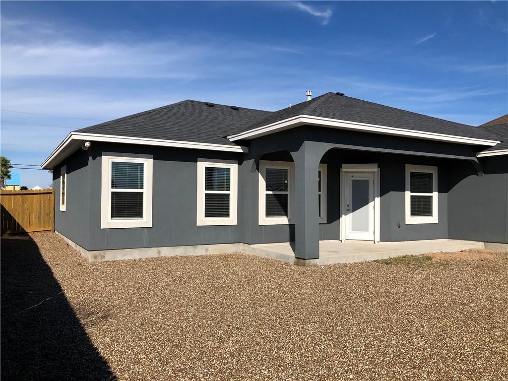 14834 Aquarius Street Corpus Christi, TX 78418 - Photo 31 of 34 a front view of a house with a yard