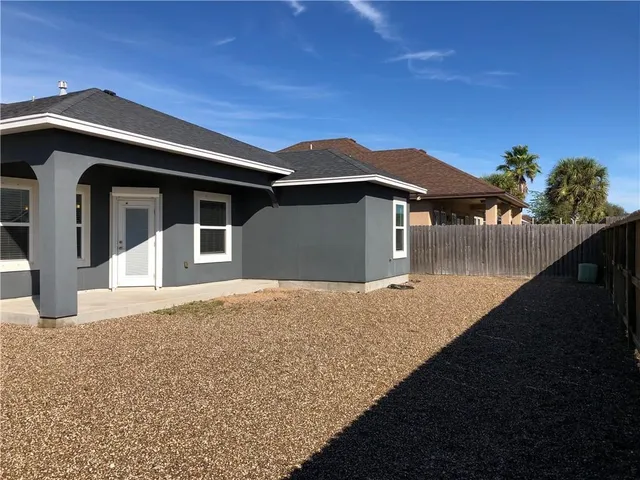 a house with yard in front of it