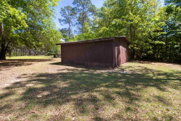 a backyard of a house with lots of green space