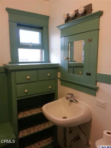 a view of a kitchen with cabinets