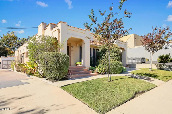 a view of a house with a street