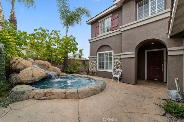 a view of house with outdoor space