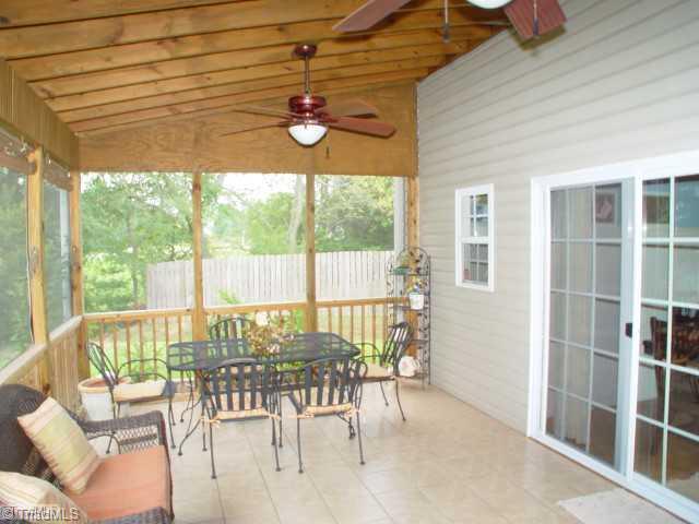 115 Salem Ridge Court Clemmons, NC 27012 - Photo 14 of 16 Enclosed Porch.