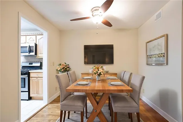 a view of a dining room with furniture