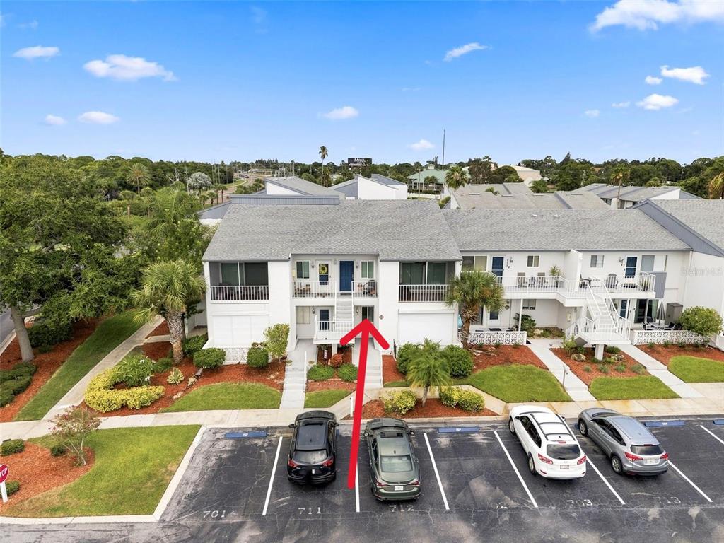 14800 Walsingham Road, Unit 702 Largo, FL 33774 - Photo 5 of 42 an aerial view of a house with a swimming pool