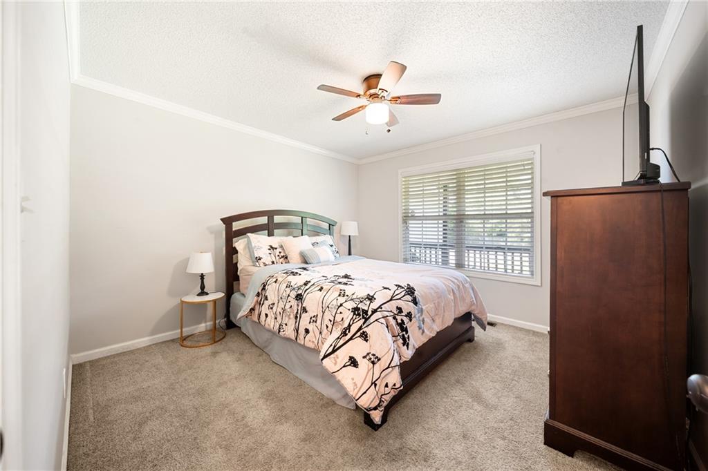 921 Pace Road Hiram, GA 30141 - Photo 21 of 41 a bedroom with a bed and window