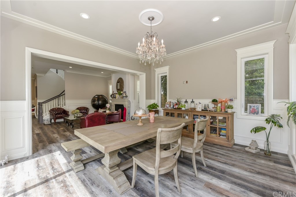 18 Tomango Lake Forest, CA 92630 - Photo 12 of 45 a view of a dining room with furniture and wooden floor