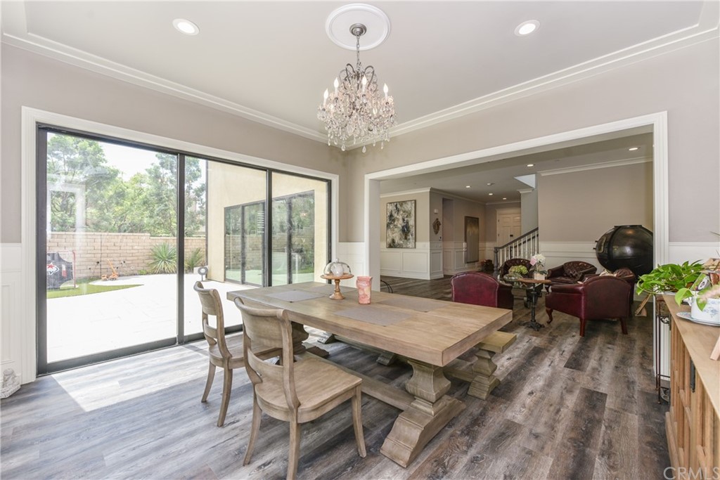 18 Tomango Lake Forest, CA 92630 - Photo 13 of 45 a view of a dining room with furniture window and wooden floor