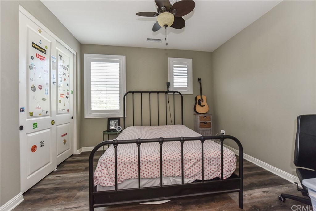 18 Tomango Lake Forest, CA 92630 - Photo 21 of 45 a bedroom with a bed and a window