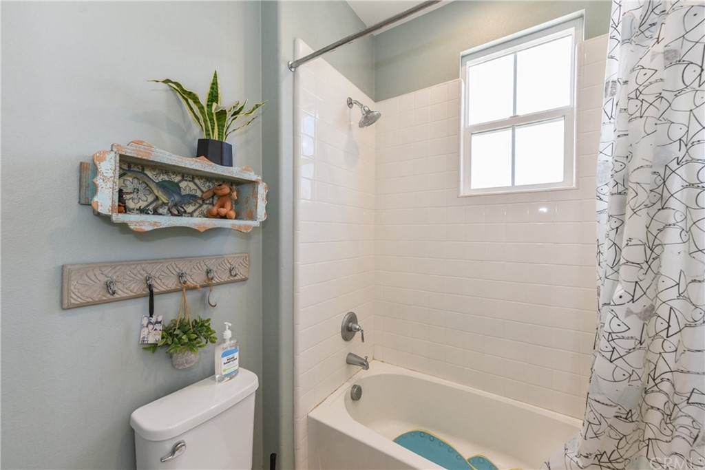 18 Tomango Lake Forest, CA 92630 - Photo 25 of 45 a bath room with a bathtub and a shower