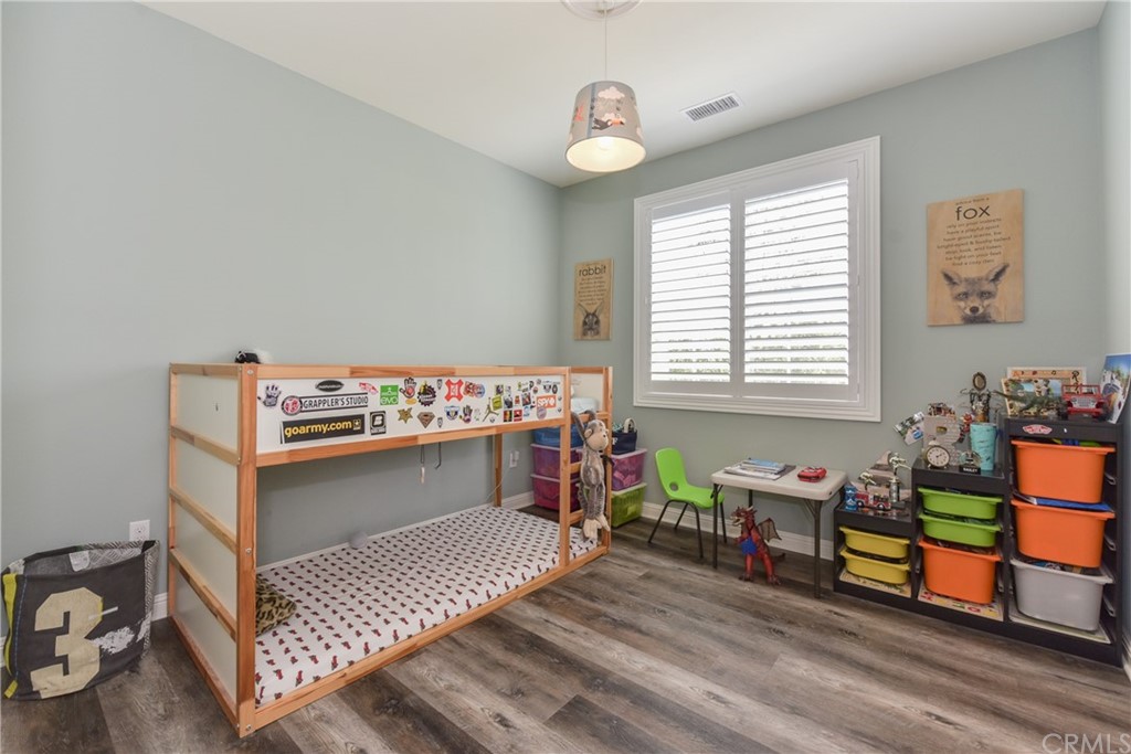 18 Tomango Lake Forest, CA 92630 - Photo 27 of 45 a bedroom with furniture and a window