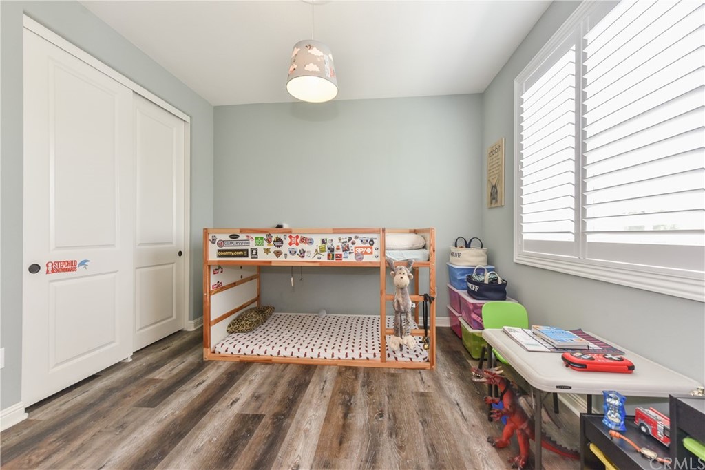 18 Tomango Lake Forest, CA 92630 - Photo 28 of 45 a bedroom with a bed and a window