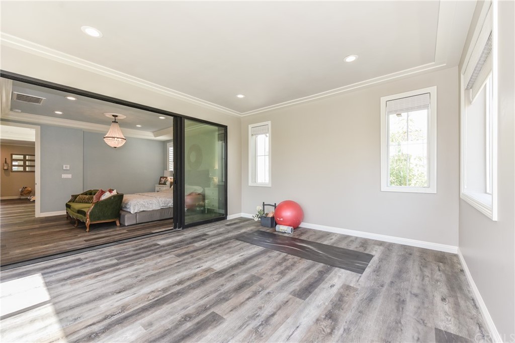 18 Tomango Lake Forest, CA 92630 - Photo 34 of 45 a view of a room with wooden floor and two windows