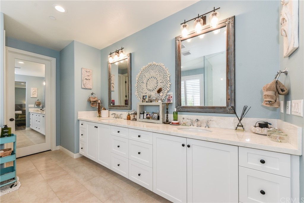 18 Tomango Lake Forest, CA 92630 - Photo 37 of 45 a bathroom with a double vanity sink mirror and a