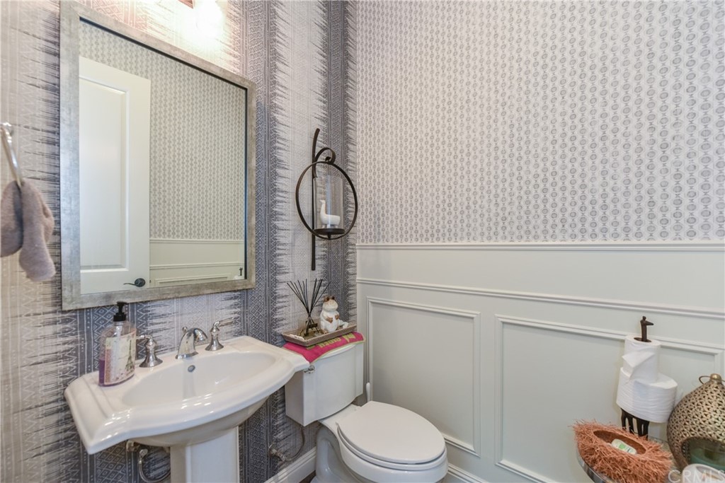 18 Tomango Lake Forest, CA 92630 - Photo 4 of 45 a bathroom with a sink a toilet and shower